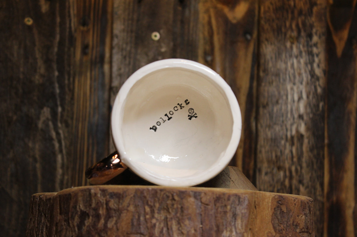 Bollocks. Small tea cup