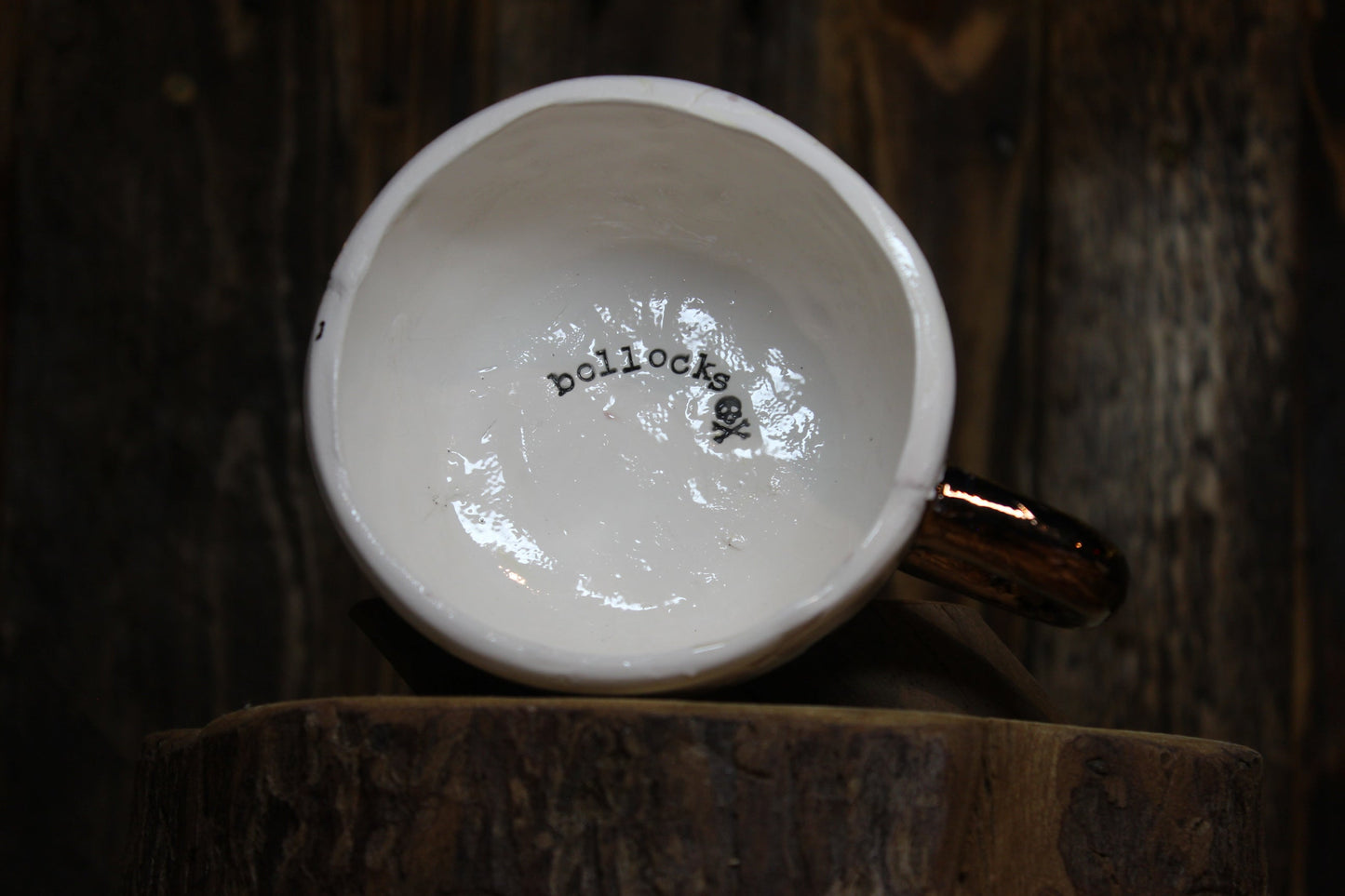 Bollocks. Small cappuccino cup