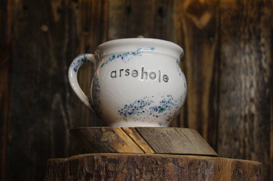 Arsehole. Small tea cup