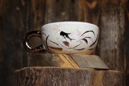 Bollocks. Small cappuccino cup